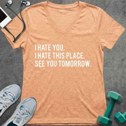 Heather peach t-shirt printed with "I Hate You. I Hate This Place. See You Tomorrow."