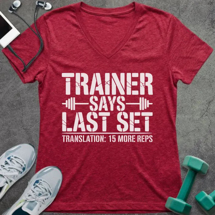 Heather red t-shirt printed with "Trainer Says Last Set Translation: 15 More Reps" in white