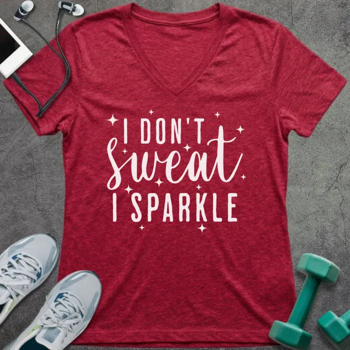 Heather red t-shirt printed with "I Don't Sweat, I Sparkle" in white, with sparkle graphics