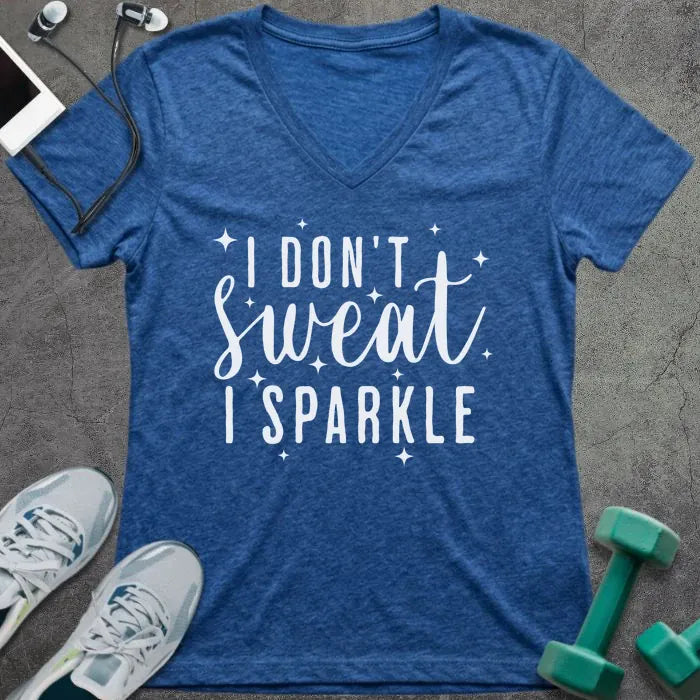 Heather true royal t-shirt printed with "I Don't Sweat, I Sparkle" in white, with sparkle graphics