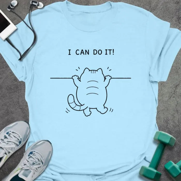 Light Blue t-shirt printed with "I CAN DO IT!" in black, with cat attempting pullup