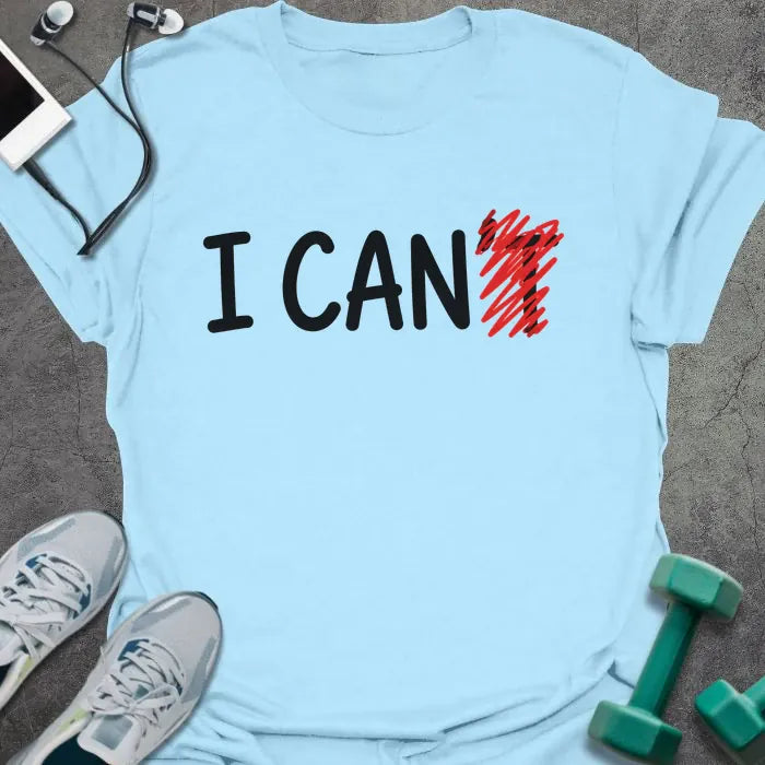 Light blue t-shirt printed with "I CAN't" in black and red, with t crossed out