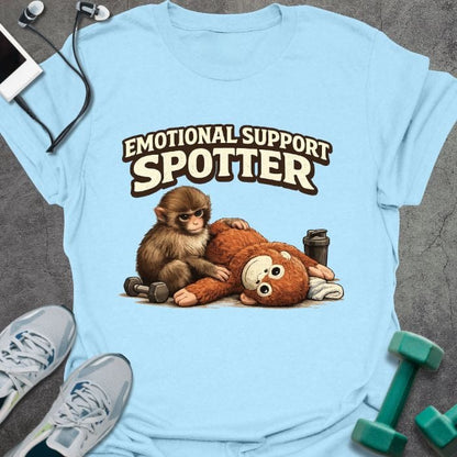 Light blue t-shirt printed with "Emotional Support Spotter", with illustration of monkey and teddy bear