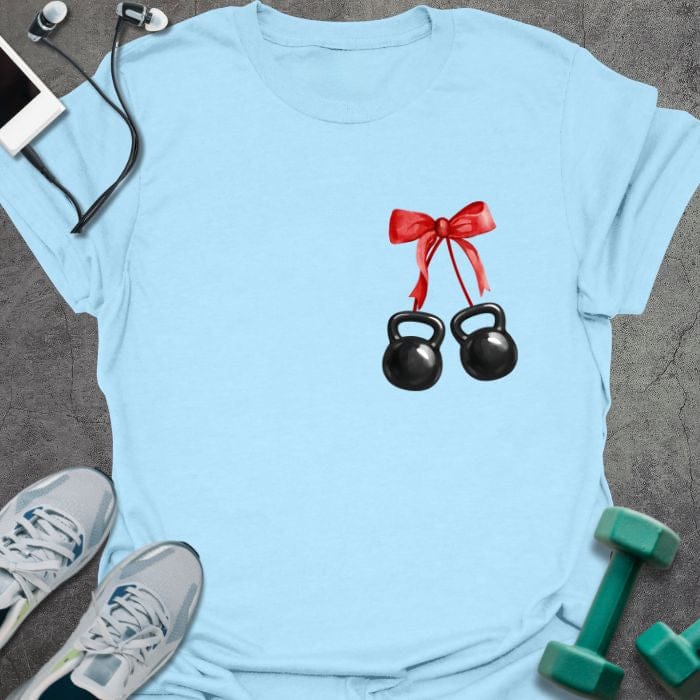 Light blue t-shirt with two kettlebells tied with a red ribbon in red, white
