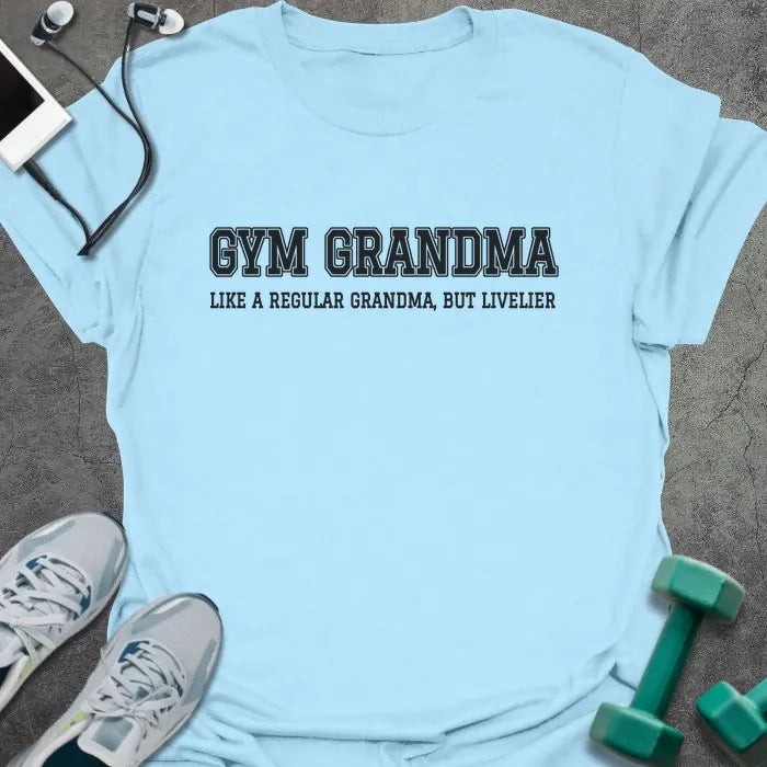 Light blue t-shirt printed with "GYM GRANDMA, LIKE A REGULAR GRANDMA, BUT LIVELIER" in charcoal varsity letters