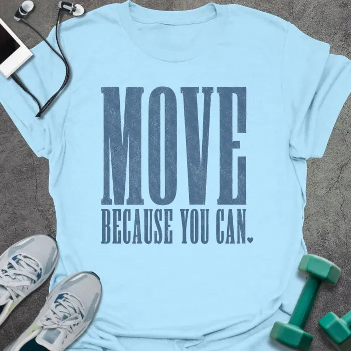 Light Blue t-shirt printed with "MOVE BECAUSE YOU CAN." in steel blue bold caps