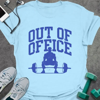 Light blue t-shirt printed with "Out of Office" in blue, with a figure squatting