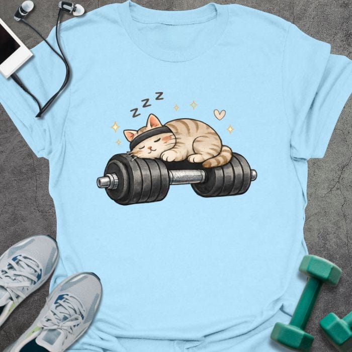Light blue t-shirt with a sleeping cat on a dumbbell in tan, white