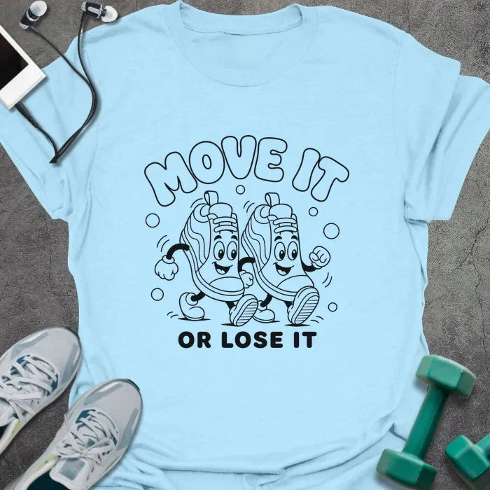 Light Blue t-shirt printed with "MOVE IT OR LOSE IT" in black line art with two anthropomorphic sneakers