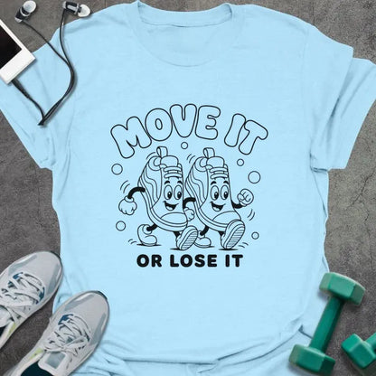 Light Blue t-shirt printed with "MOVE IT OR LOSE IT" in black line art with two anthropomorphic sneakers