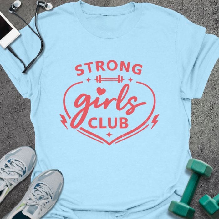 Light blue t-shirt printed with "STRONG girls CLUB" in red, with a heart, barbell, and lightning bolt icons