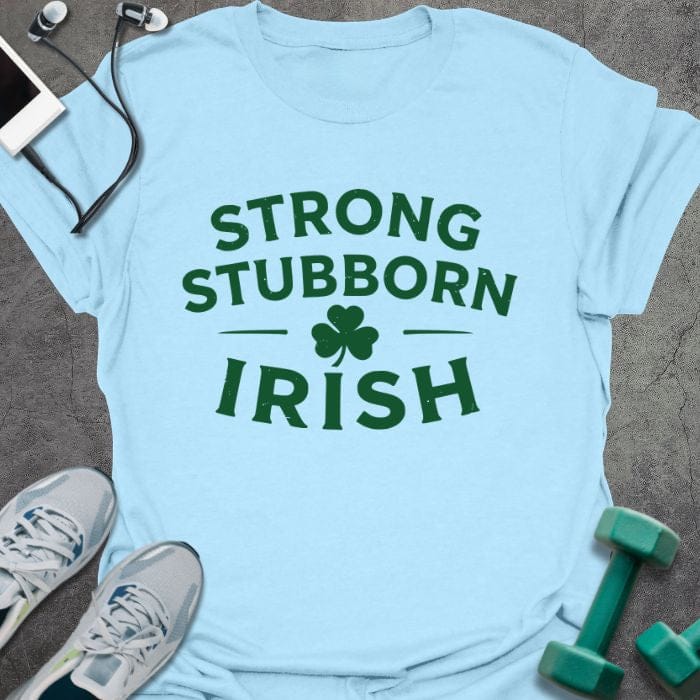 Light blue t-shirt printed with "Strong Stubborn Irish" in green, with clover