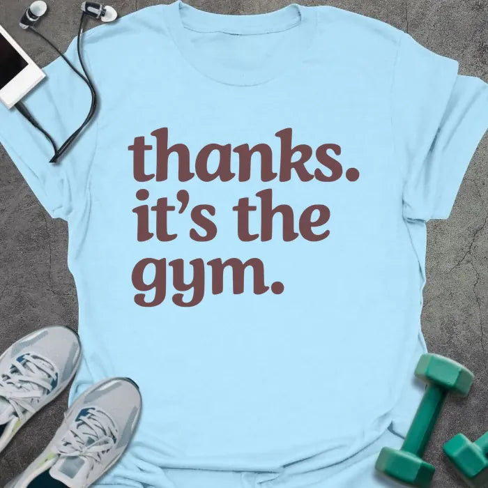 Light blue t-shirt printed with "thanks. it's the gym." in red