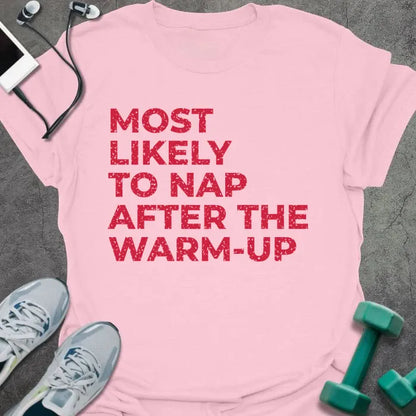 Light pink t-shirt printed with "MOST LIKELY TO NAP AFTER THE WARM-UP" in red