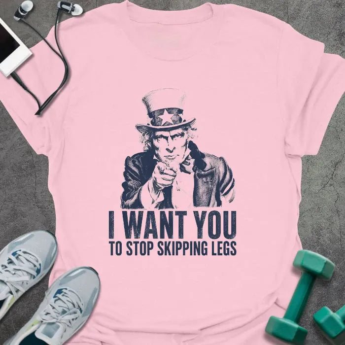 Light pink t-shirt printed with "I Want You to Stop Skipping Legs" in navy, with an illustration of Uncle Sam pointing