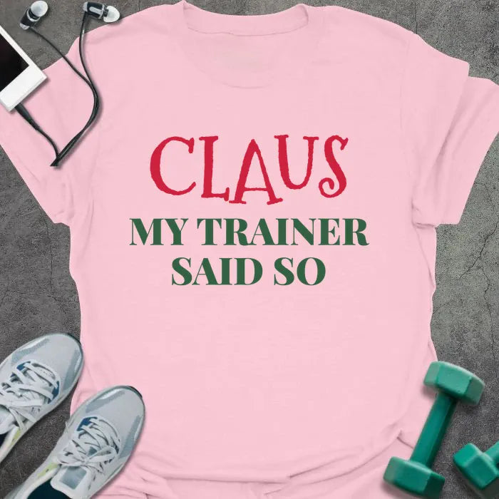 Light pink t-shirt printed with "CLAUS MY TRAINER SAID SO" in red and green