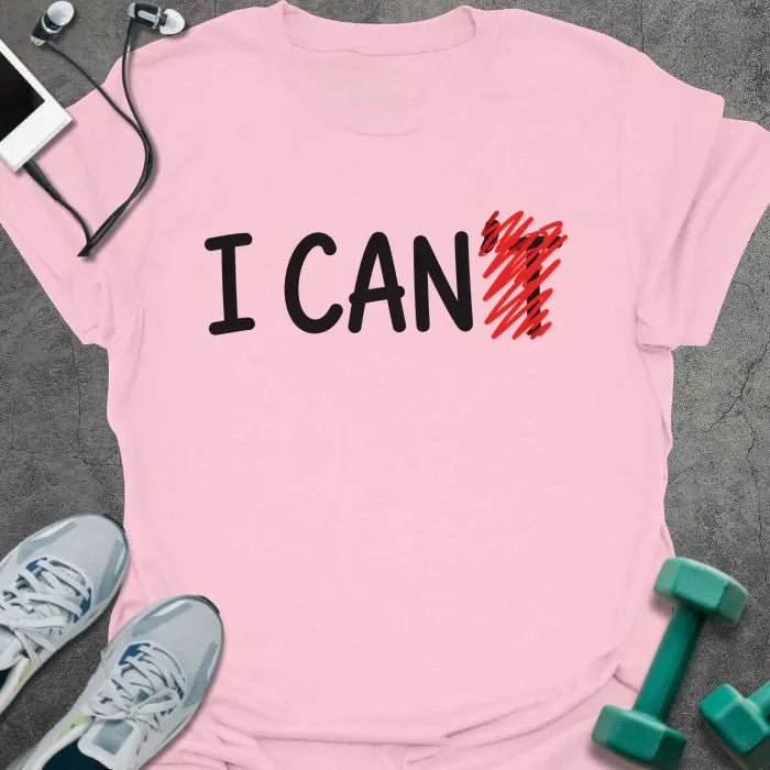 Light pink t-shirt printed with "I CAN't" in black and red, with t crossed out
