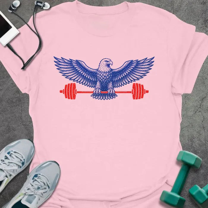 Light pink t-shirt with an eagle holding a barbell in blue and red