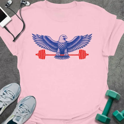 Light pink t-shirt with an eagle holding a barbell in blue and red