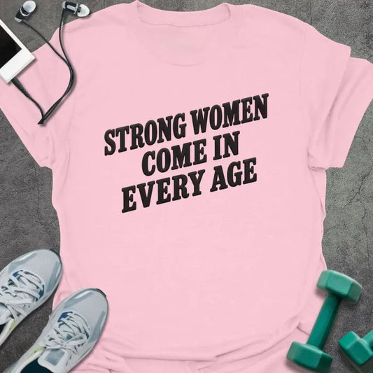 Light Pink t-shirt printed with "STRONG WOMEN COME IN EVERY AGE" in black bold caps