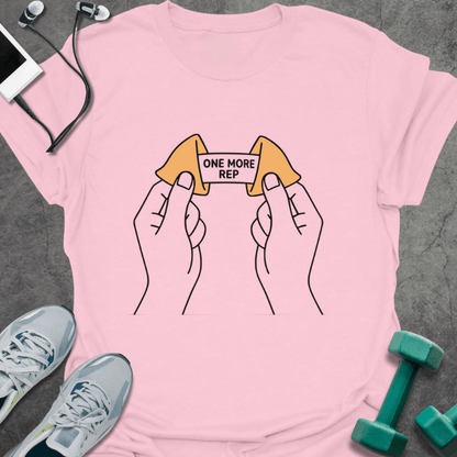 Light pink t-shirt with a fortune cookie and two lemons connected by a barbell
