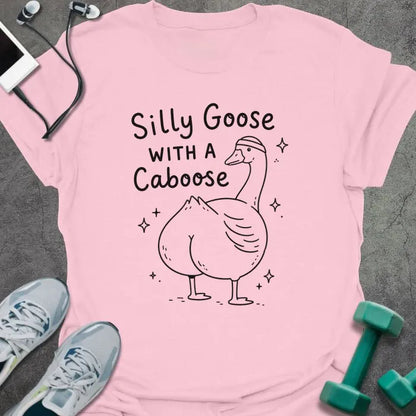 Light Pink t-shirt printed with "Silly Goose WITH A Caboose" in black, with goose with sparkles