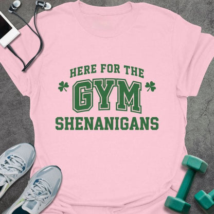 Light pink t-shirt printed with "Here for the Gym Shenanigans" in green