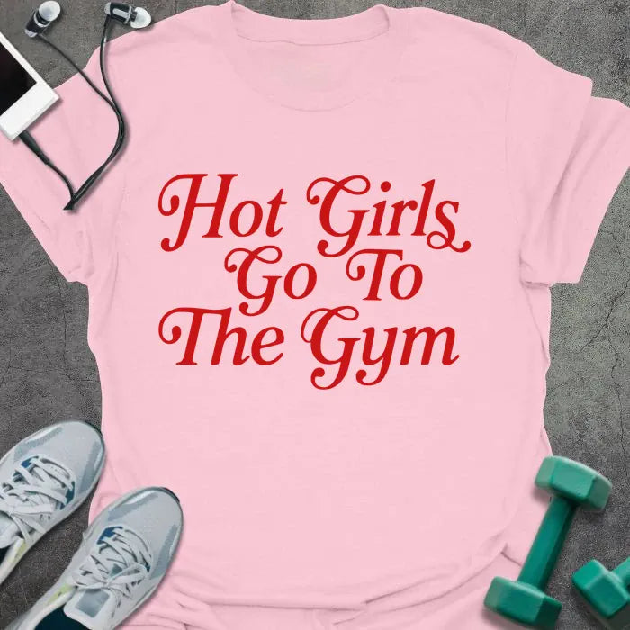 Light pink t-shirt printed with "Hot Girls Go To The Gym" in red