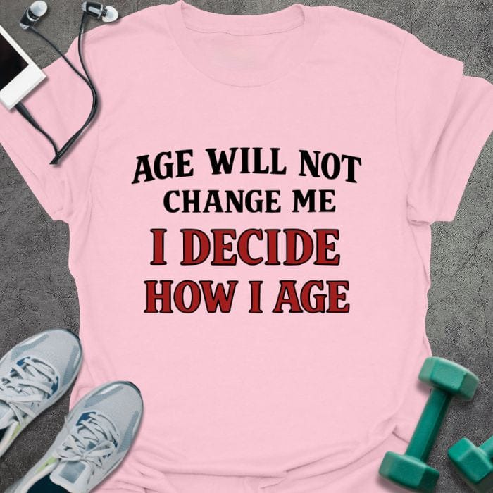 Light pink t-shirt printed with "Age Will Not Change Me I Decide How I Age" in red
