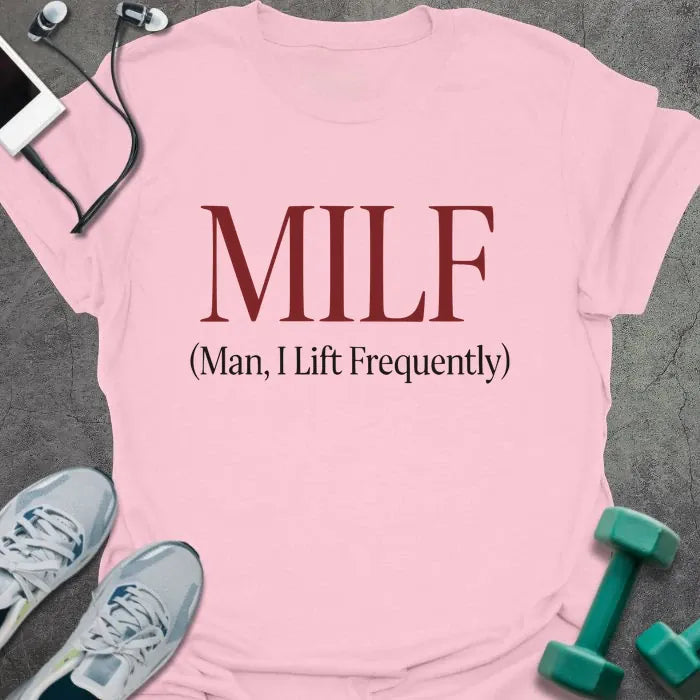 Light pink t-shirt printed with "MILF (Man, I Lift Frequently)" in red