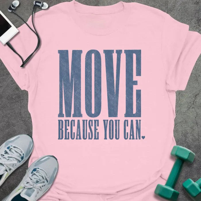 Light Pink t-shirt printed with "MOVE BECAUSE YOU CAN." in steel blue bold caps