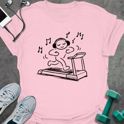 Light pink t-shirt with stick figure on treadmill with headphones