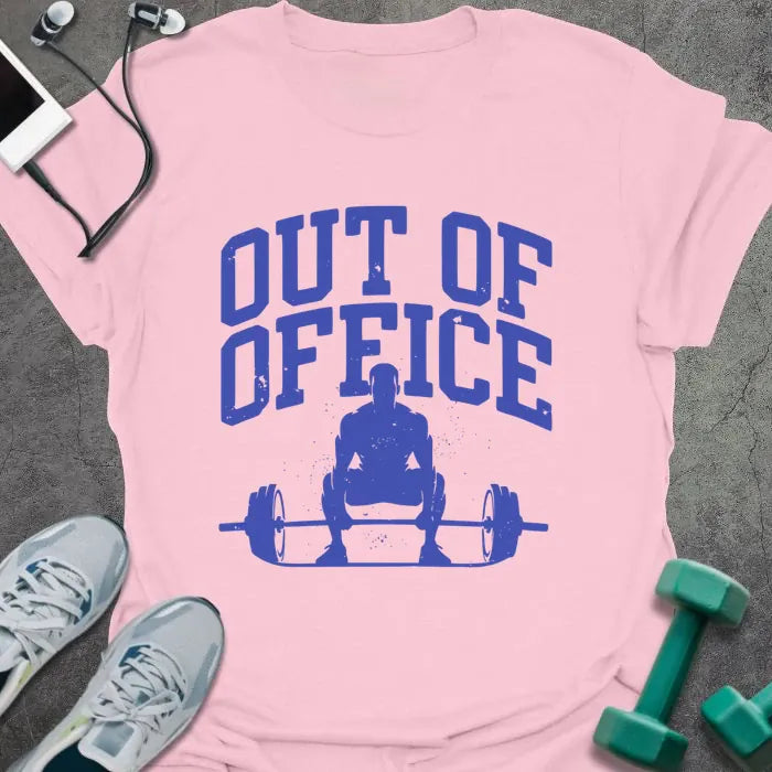 Light pink t-shirt printed with "Out of Office" in blue, with a figure squatting