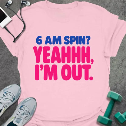 Light pink T-shirt printed with "6 AM SPIN? YEAHHH, I'M OUT." in blue and pink