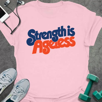 Light Pink t-shirt printed with "Strength is Ageless" in blue and red lettering