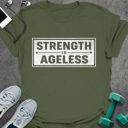 Military green t-shirt printed with "Strength is Ageless" in blue, with a rectangular badge design
