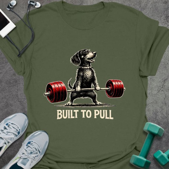Military green t-shirt printed with "Built to Pull" in white, red, with a dog lifting a barbell