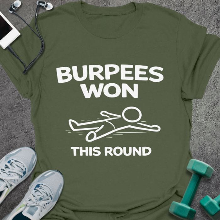 Military green t-shirt printed with "Burpees Won This Round" in white, with an illustration of a stick figure on the ground