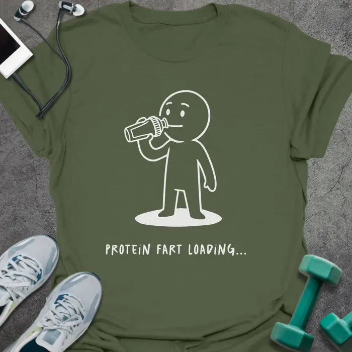 Military green t-shirt printed with "Protein Fart Loading...", with an illustration of a stick figure drinking protein