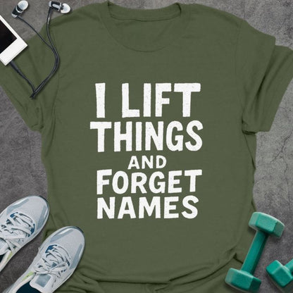 Military green t-shirt printed with "I Lift Things and Forget Names"
