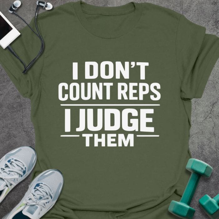 Military green t-shirt printed with "I Don't Count Reps I Judge Them" in white