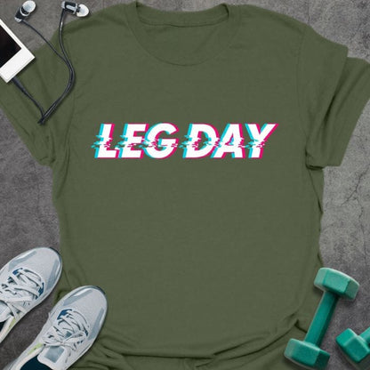 Military green t-shirt printed with "Leg Day" in pink and blue glitch effect