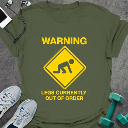 Military green t-shirt printed with "Warning Legs Currently Out of Order" in yellow, with a yellow warning sign of a figure crawling