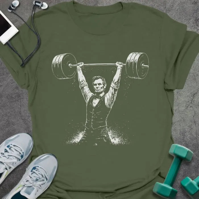 Military green t-shirt with Abraham Lincoln lifting barbell graphic in white