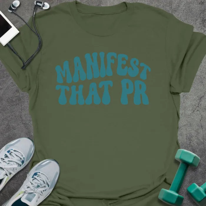 Military green t-shirt printed with "Manifest That PR" in teal