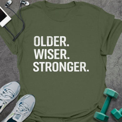 Military green t-shirt printed with "Older. Wiser. Stronger." in white