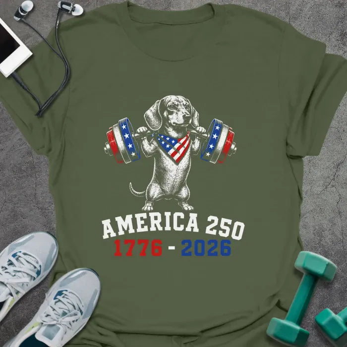 Military green t-shirt with an American flag dachshund with dumbbells graphic in white and red