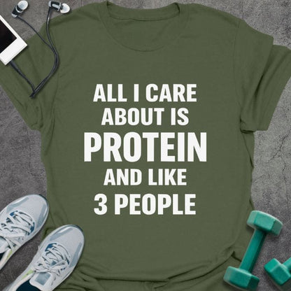 Military green t-shirt printed with "All I Care About is Protein and Like 3 People"