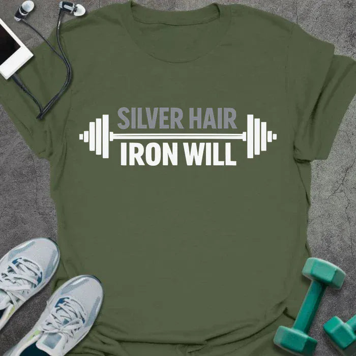 Military green t-shirt printed with "Silver Hair Iron Will" in white, with a dumbbell graphic