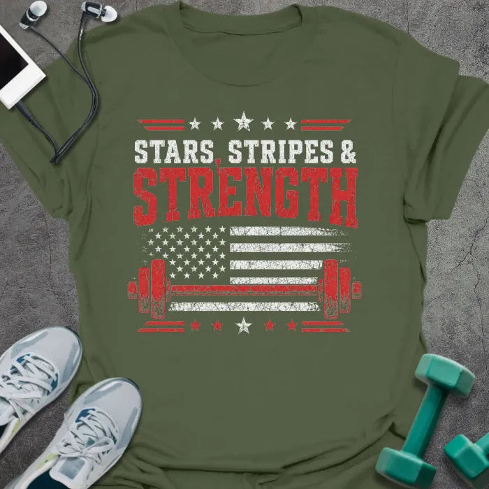 Military green t-shirt printed with "Stars Stripes & Strength" in white, red, and blue, with a distressed flag and barbell graphics
